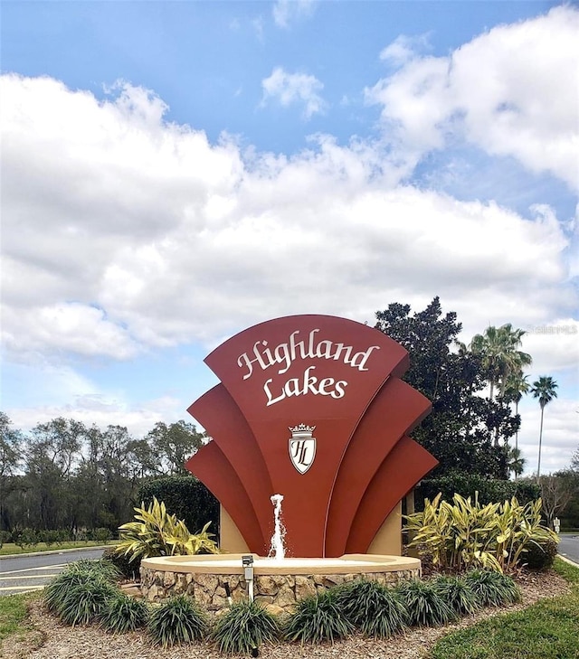 view of community sign