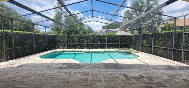8719 Kenmure Cv, Orlando, FL 32836 - view of pool with a pool with connected hot tub, a patio, and a lanai
