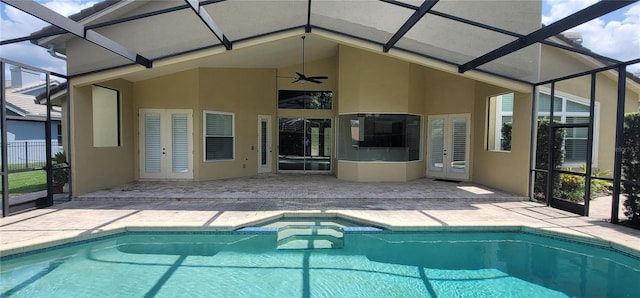 8719 Kenmure Cv, Orlando, FL 32836 - swimming pool featuring french doors, a patio, and glass enclosure