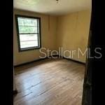 2826 Crk 610, Bushnell, FL 33513 - unfurnished room with wood finished floors