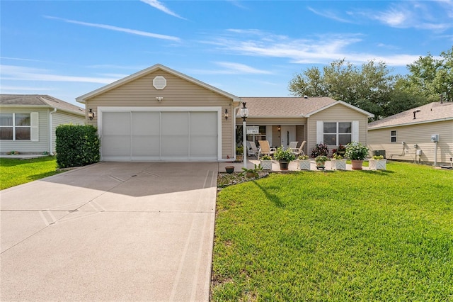 ranch-style home with a front lawn, driveway, an attached garage, and a porch