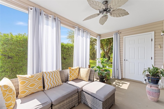 sunroom featuring carpet flooring