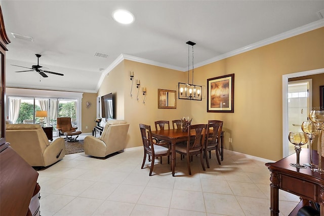 1053 Alcove Loop, The Villages, FL 32162 - dining space with crown molding, baseboards, a ceiling fan, a chandelier, and light tile patterned floors