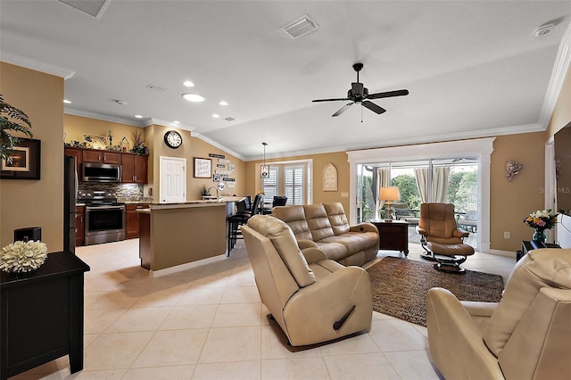 1053 Alcove Loop, The Villages, FL 32162 - living area with crown molding, vaulted ceiling, ceiling fan, healthy amount of natural light, and recessed lighting