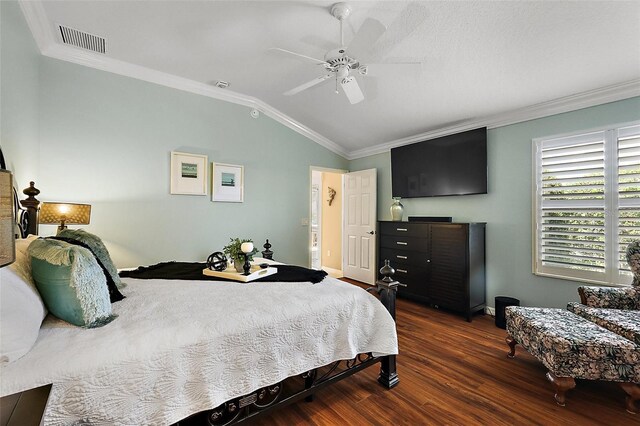 1053 Alcove Loop, The Villages, FL 32162 - bedroom featuring ornamental molding, vaulted ceiling, dark wood-type flooring, baseboards, and a ceiling fan