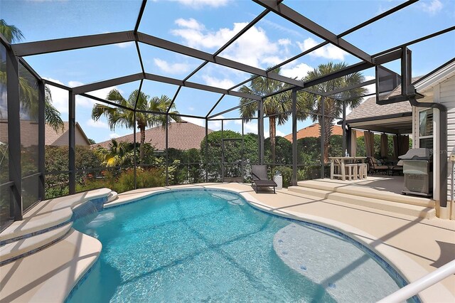1053 Alcove Loop, The Villages, FL 32162 - outdoor pool featuring a patio area and glass enclosure