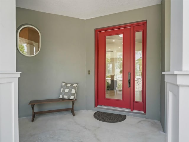 563 Dowling Cir, Lady Lake, FL 32159 - doorway to property with stucco siding