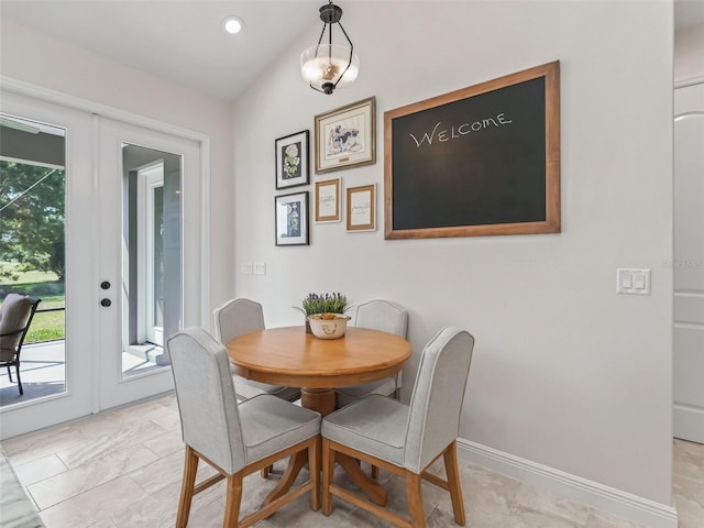 563 Dowling Cir, Lady Lake, FL 32159 - dining room featuring plenty of natural light, french doors, baseboards, and recessed lighting