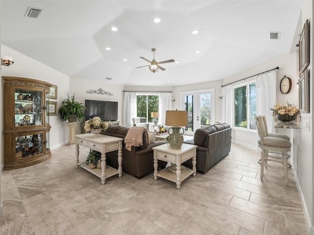 563 Dowling Cir, Lady Lake, FL 32159 - living room with baseboards, a ceiling fan, recessed lighting, vaulted ceiling, and french doors