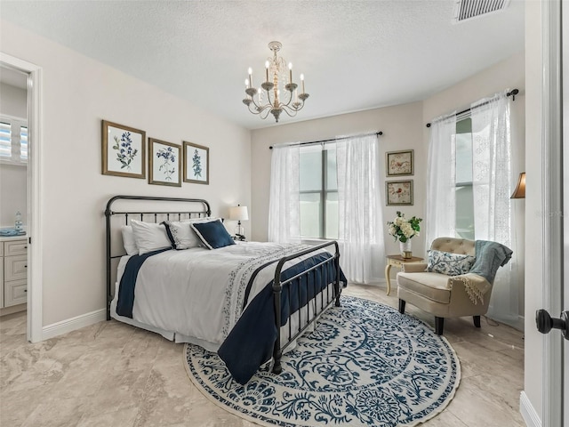 563 Dowling Cir, Lady Lake, FL 32159 - bedroom with a chandelier, baseboards, and a textured ceiling