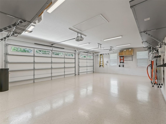 563 Dowling Cir, Lady Lake, FL 32159 - garage featuring a garage door opener