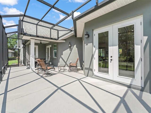 563 Dowling Cir, Lady Lake, FL 32159 - rear view of house featuring french doors, stucco siding, a patio, and a ceiling fan