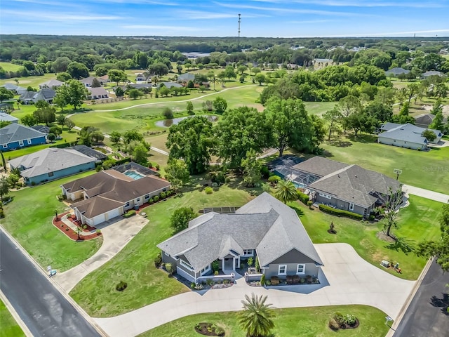 563 Dowling Cir, Lady Lake, FL 32159 - aerial perspective of suburban area with a golf course
