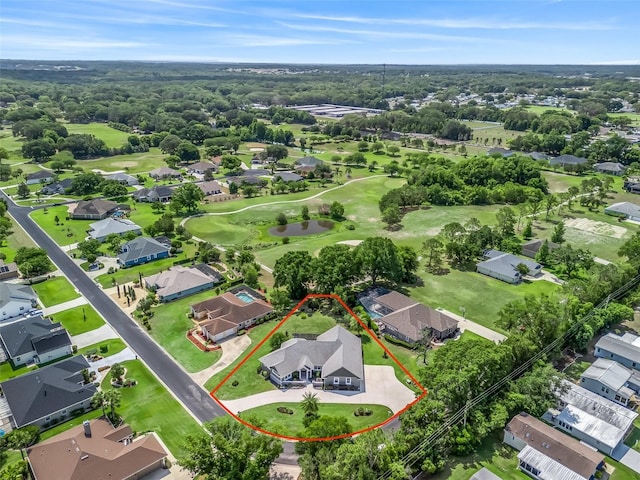 563 Dowling Cir, Lady Lake, FL 32159 - aerial perspective of suburban area featuring property boundaries highlighted and a golf course