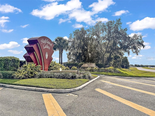 5618 Rosewall Cir, Leesburg, FL 34748 - community sign with uncovered parking