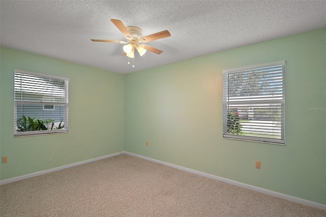 5618 Rosewall Cir, Leesburg, FL 34748 - unfurnished room featuring healthy amount of natural light, ceiling fan, carpet, baseboards, and a textured ceiling
