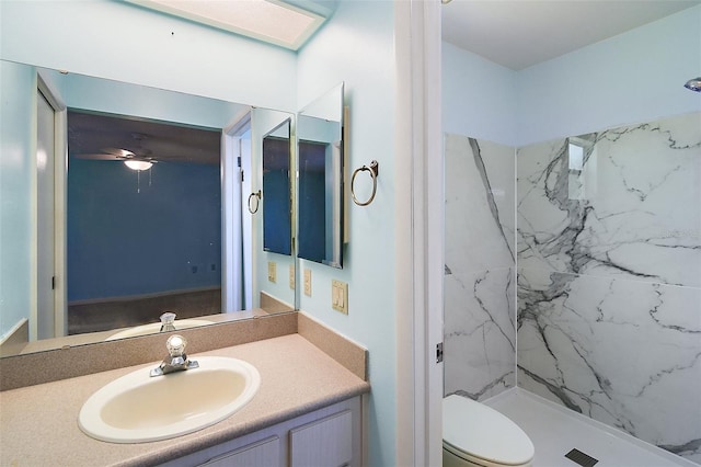 5618 Rosewall Cir, Leesburg, FL 34748 - full bath with a marble finish shower, toilet, vanity, a ceiling fan, and a skylight