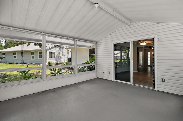 5618 Rosewall Cir, Leesburg, FL 34748 - unfurnished sunroom with lofted ceiling, plenty of natural light, and ceiling fan