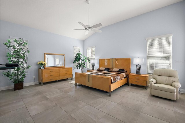 4033 Swaying Palm Ct, The Villages, FL 32163 - tiled bedroom with ceiling fan, baseboards, and high vaulted ceiling