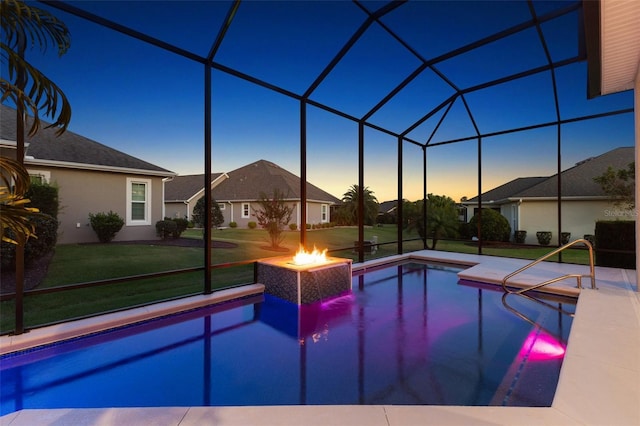 4033 Swaying Palm Ct, The Villages, FL 32163 - outdoor pool with a yard, a patio, a fire pit, and glass enclosure