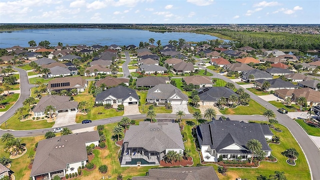4033 Swaying Palm Ct, The Villages, FL 32163 - aerial view of residential area with a nearby body of water