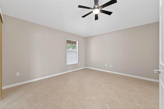 2744 Gresham Ave, The Villages, FL 32162 - empty room featuring ceiling fan, baseboards, light tile patterned floors, and a textured ceiling