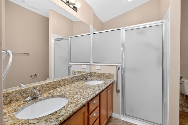 2744 Gresham Ave, The Villages, FL 32162 - full bathroom with toilet, a shower stall, and double vanity