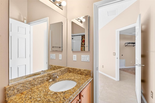 2744 Gresham Ave, The Villages, FL 32162 - bathroom with vanity, tile patterned flooring, and baseboards