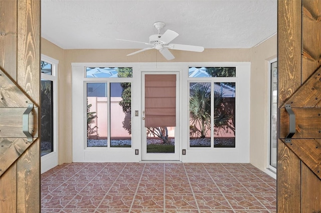 2744 Gresham Ave, The Villages, FL 32162 - unfurnished sunroom with plenty of natural light