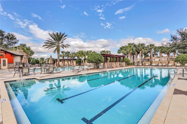 community pool featuring a patio