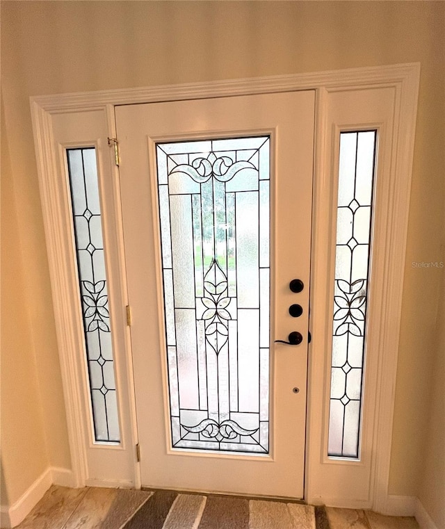 108 Whispering Pines Way, Davenport, FL 33837 - entrance foyer featuring baseboards