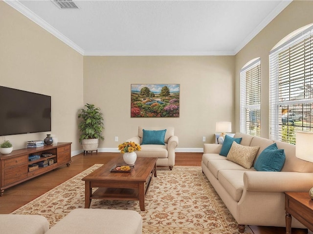 108 Whispering Pines Way, Davenport, FL 33837 - living room with ornamental molding, baseboards, and wood finished floors