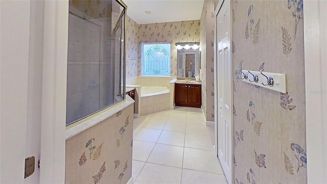 108 Whispering Pines Way, Davenport, FL 33837 - full bath featuring tile patterned floors, a bath, a stall shower, vanity, and wallpapered walls