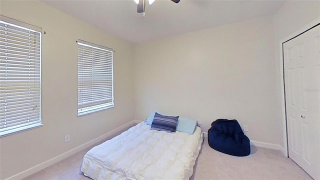 108 Whispering Pines Way, Davenport, FL 33837 - bedroom featuring carpet flooring, baseboards, and a ceiling fan