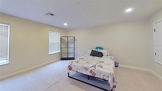108 Whispering Pines Way, Davenport, FL 33837 - bedroom featuring light colored carpet, baseboards, and recessed lighting