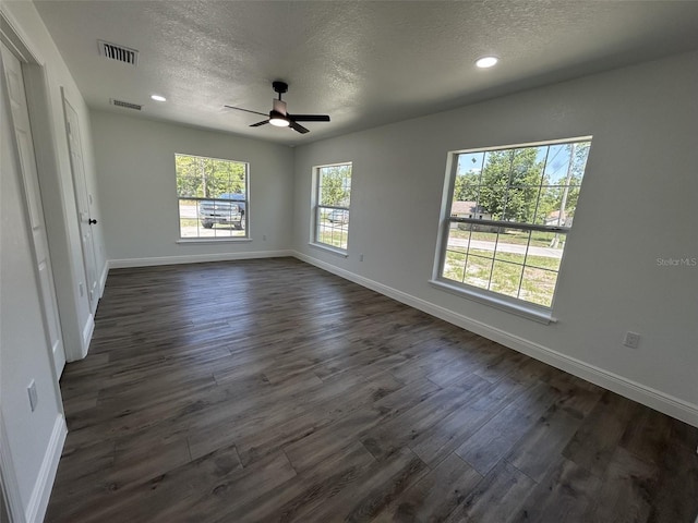 2 Pine Terrace Way, Ocala, FL 34472 - unfurnished bedroom with a textured ceiling, dark wood-style flooring, baseboards, recessed lighting, and a ceiling fan