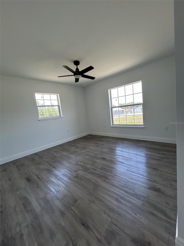 2 Pine Terrace Way, Ocala, FL 34472 - spare room with dark wood finished floors, a ceiling fan, and baseboards