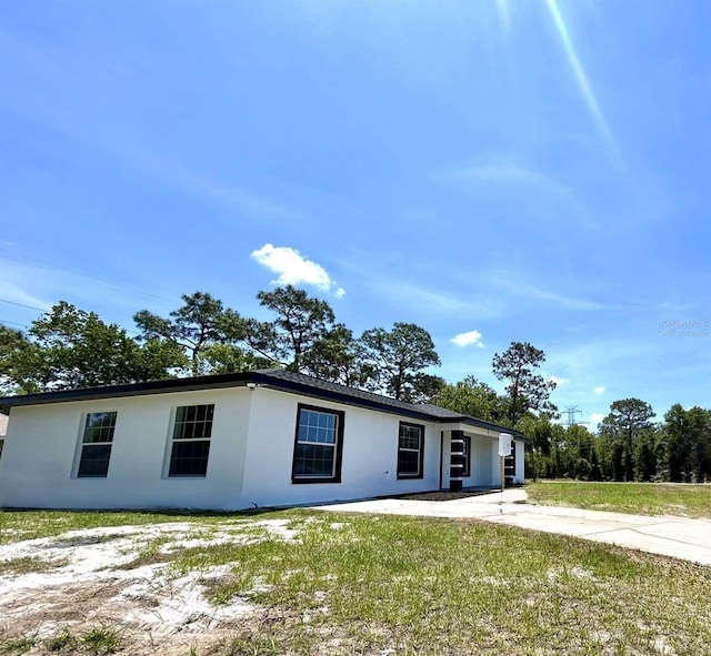 2 Pine Terrace Way, Ocala, FL 34472 - ranch-style home featuring stucco siding