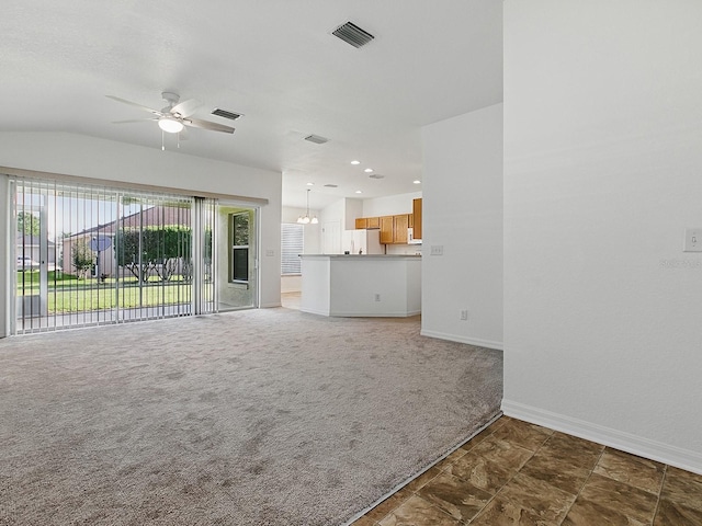 8601 SE 133rd St, Summerfield, FL 34491 - unfurnished living room with baseboards, ceiling fan, carpet floors, and recessed lighting
