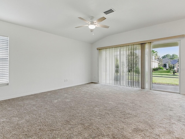 8601 SE 133rd St, Summerfield, FL 34491 - unfurnished room featuring lofted ceiling, ceiling fan, carpet flooring, and baseboards