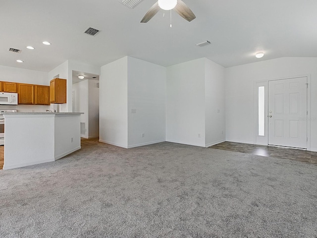 8601 SE 133rd St, Summerfield, FL 34491 - unfurnished living room featuring ceiling fan, light carpet, recessed lighting, and baseboards