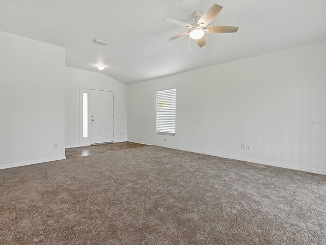 8601 SE 133rd St, Summerfield, FL 34491 - empty room with lofted ceiling, carpet, ceiling fan, and baseboards