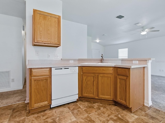 8601 SE 133rd St, Summerfield, FL 34491 - kitchen with white dishwasher, a sink, a peninsula, light countertops, and a ceiling fan