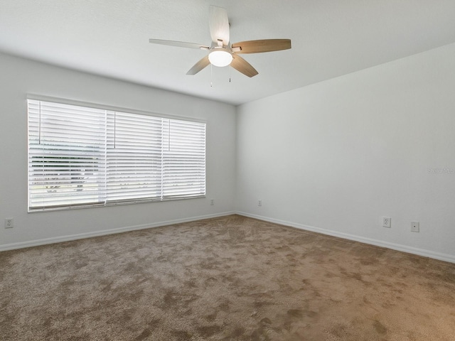8601 SE 133rd St, Summerfield, FL 34491 - carpeted empty room with ceiling fan and baseboards