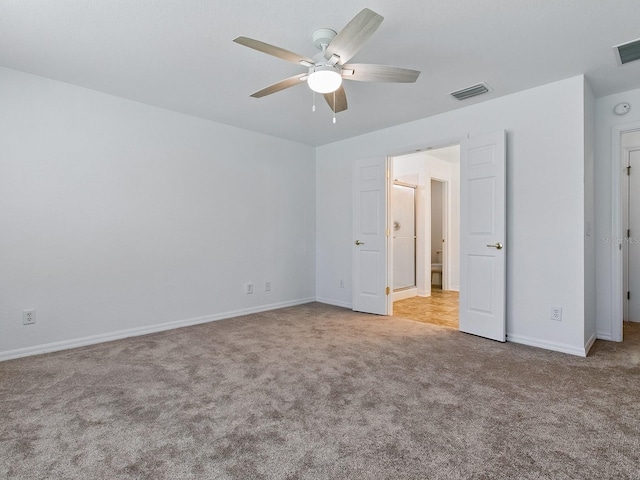 8601 SE 133rd St, Summerfield, FL 34491 - unfurnished bedroom featuring carpet flooring, baseboards, and a ceiling fan