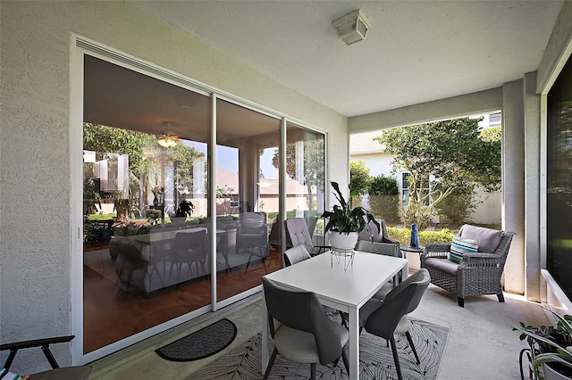 5604 Gulf Stream St, Tavares, FL 32778 - sunroom featuring a textured wall and ceiling fan