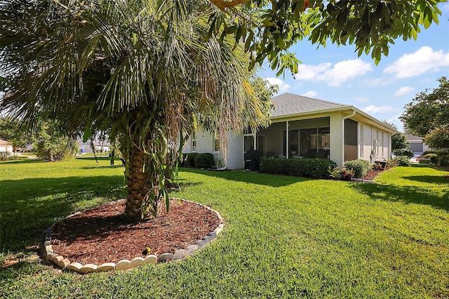 5604 Gulf Stream St, Tavares, FL 32778 - view of green lawn featuring a sunroom