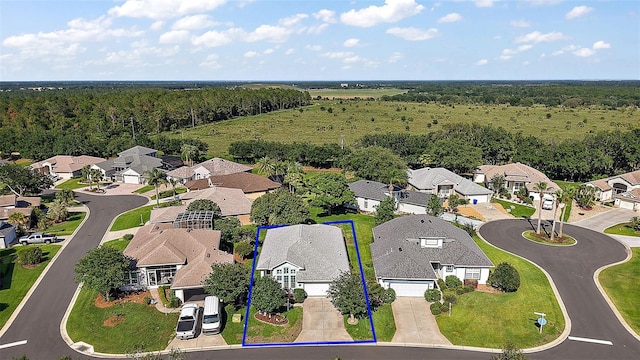 5604 Gulf Stream St, Tavares, FL 32778 - aerial perspective of suburban area featuring property boundaries highlighted and a forest
