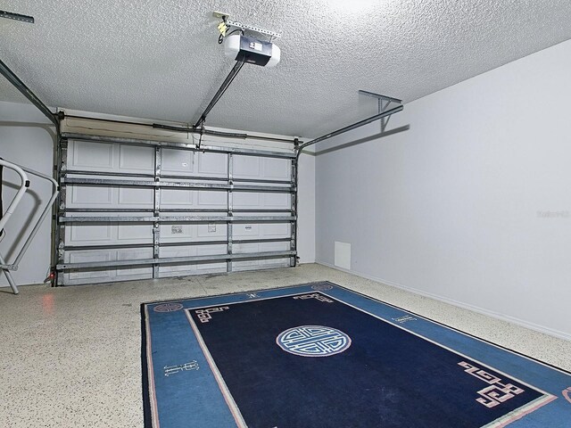 1722 Moreno Pl, The Villages, FL 32159 - garage featuring a garage door opener