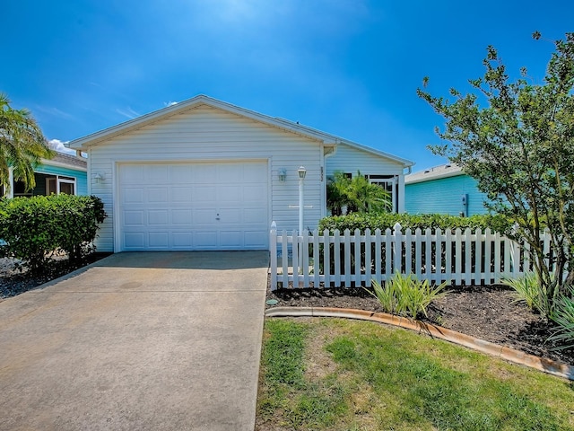 1722 Moreno Pl, The Villages, FL 32159 - ranch-style home with fence and a garage